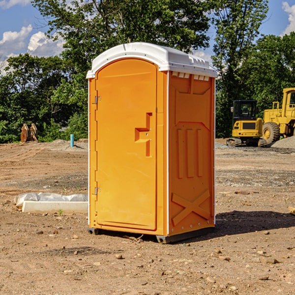 what is the cost difference between standard and deluxe portable toilet rentals in Marion Center